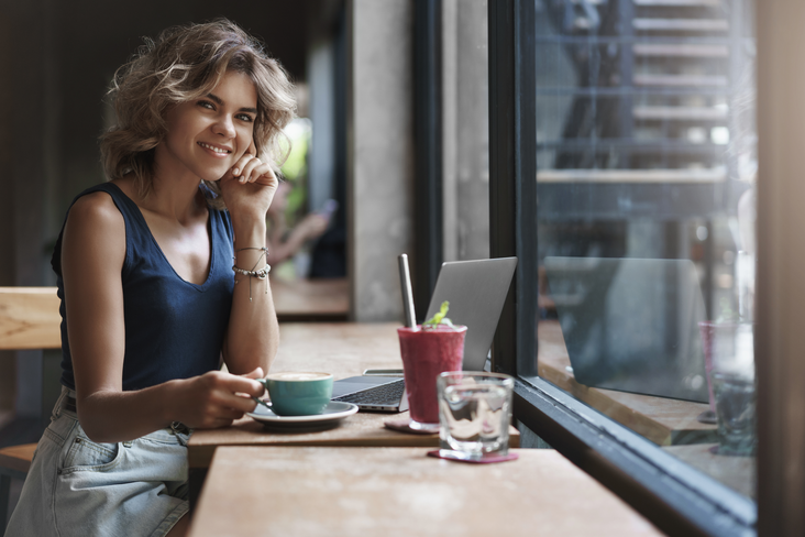 Businesswoman working in a cafe