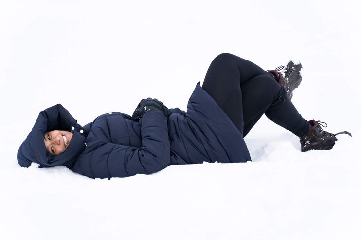 Woman on snow smiling