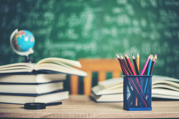 Books with green board background