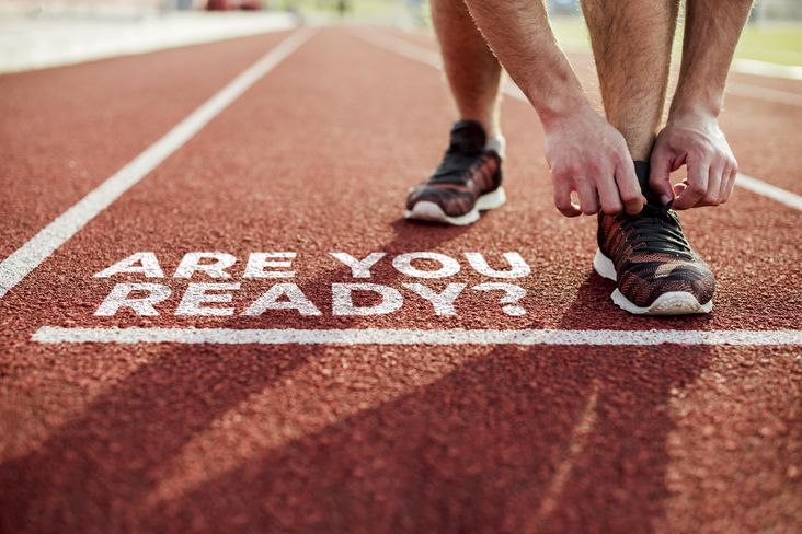 Atleta preparado para correr con el mensaje ¿Are you ready?