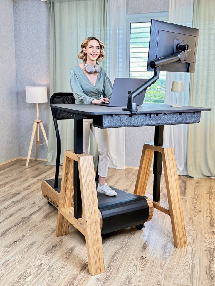 Woman working on treadmill desks from Walkolution